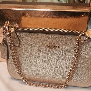 SOLD- COACH Nolita Wristlet 19 in Rose Gold Metallic Caviar Calf Leather